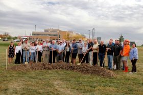 Platteville community members and leaders at groundbreaking event for new New Horizon Academy location in partnership with Southwest Health